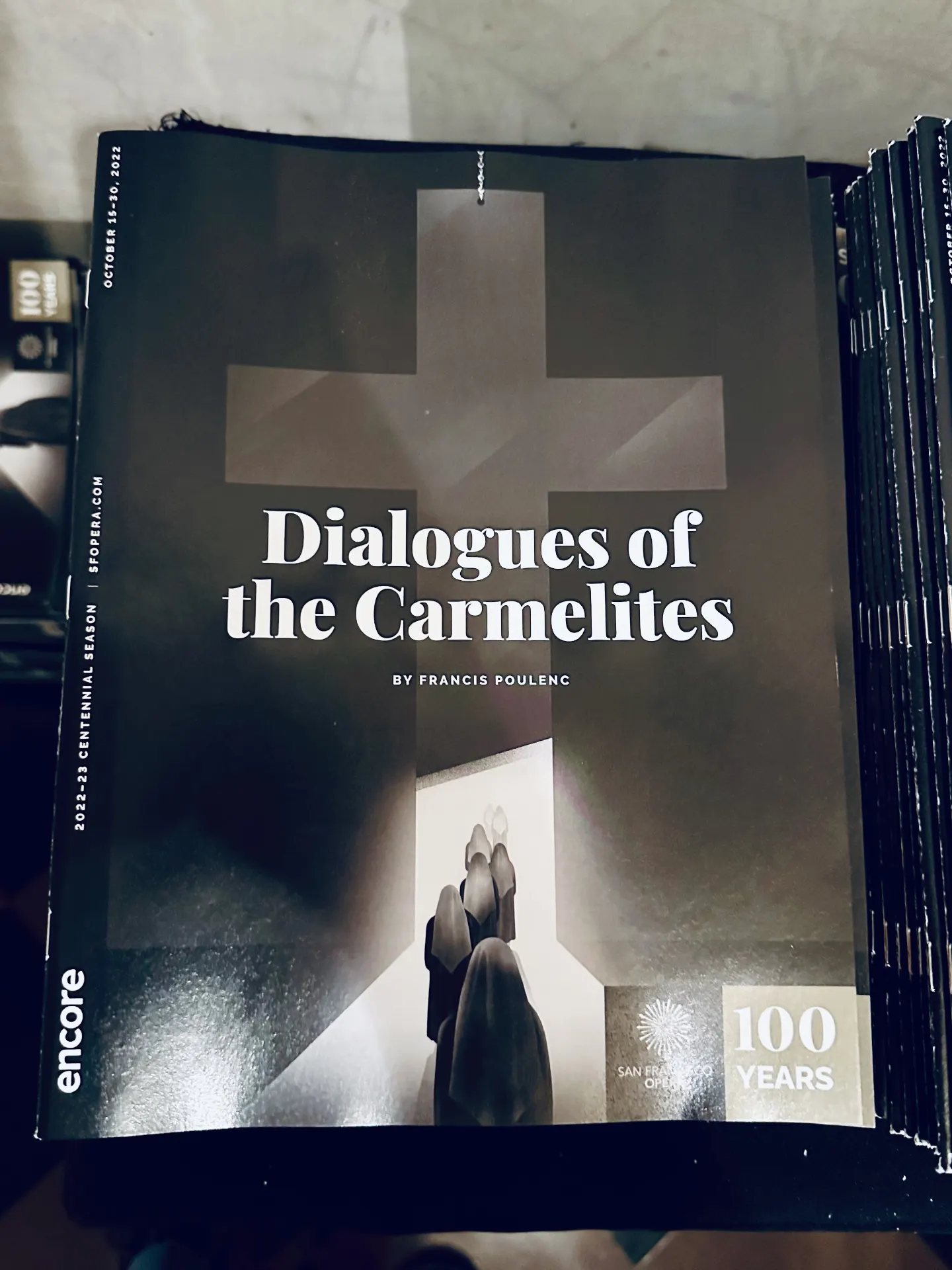 Stack of Encore programs for Dialogues of the Carmelites at San Francisco Opera, centennial season